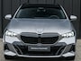 BMW 5-Serie Touring 530e xDrive · M Sportpaket Pro ·Harman Kardon · M Sport Suspension · Adaptive Led · Driving Assistant Plus · Ambient Light · Bmw Iconic Glow · M Sport Brake, Red · Shadowline Lights · Panorama Glass Roof