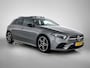 Mercedes-Benz A-klasse 180 Business Solution AMG AMG Line | Night Pakket | Panorama Schuif-Kanteldak | Sfeerverlichting | Trekhaak | MultiBeam Koplampen | Achteruitrijcamera. Inclusief 24 maanden Mercedes-Benz Certified garantie voor Europa.