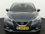 Nissan Micra 1.0 IG-T Tekna Airco auto, Apple Carplay/Android Auto, Autonomous Emergency Braking, Bluetooth, Boordcomputer, Cruise control, Parkeersensor achter, Rijstrooksensor met correctie, Voorstoelen verwarmd, Elek De Nissan Micra 1.0 IG-T Tekna uit 2020 is een compacte en zuinige hatchback die zeer geschikt is voor dagelijks gebruik. De 1,0 liter turbobenzinemotor levert vlotte prestaties en is tegelij