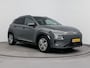 Hyundai Kona Electric EV PREMIUM 64 kWh ^| TREKHAAK | 3 FASE | WARMTEPOMP | LEDER | CLIMA | CRUISE ADAPTIEF | CAMERA | NAVI | STOEL- & STUURVERWARMING | 17'' LM VELGEN | PDC VOOR & ACHTER |