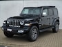 Jeep Wrangler Unlimited 4xe 380 PK Sahara | Leder | Soft Top | Overland | Camera | 18"