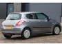 Suzuki Swift 1.2 Comfort Trekhaak dealeronderhouden Rijklaarprijs! | 12 Maanden Garantie | Onderhoudsbeurt | Nieuwe APK | Mobiliteitservice |