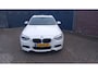 BMW 1-Serie 118i Business+.Climate control,Parking system,Cruise control,Panoramadak,Achteruitrijcamera,Lichtmetalen velgen.