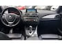 BMW 1-Serie 118i Business+.Climate control,Parking system,Cruise control,Panoramadak,Achteruitrijcamera,Lichtmetalen velgen.