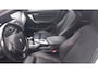 BMW 1-Serie 118i Business+.Climate control,Parking system,Cruise control,Panoramadak,Achteruitrijcamera,Lichtmetalen velgen.