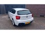 BMW 1-Serie 118i Business+.Climate control,Parking system,Cruise control,Panoramadak,Achteruitrijcamera,Lichtmetalen velgen.