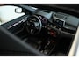 BMW X1 sDrive20i Orange Edition III | Cruise Control | HUD | HiFi | Trekhaak | Schuifdak | Stoelverwarming | Elektr. klep | Leder