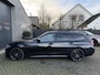 BMW 3-Serie Touring 330i High Executive M-Sport | Panoramadak | Camera | 20 Inch Lichtmetalen Velgen | Head-Up Display |
