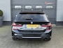 BMW 3-Serie Touring 330i High Executive M-Sport | Panoramadak | Camera | 20 Inch Lichtmetalen Velgen | Head-Up Display |
