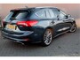 Ford Focus Wagon BWJ 2021 1.0 124 PK EcoBoost Hybrid Vignale HEAD UP DISPLAY / TREKHAAK | PANORAMADAK | XENON | STOELVERW. | LEDER | STUURVERW. | ADAPTIVE CRUISE | ELEKTRISCHE ACHTERKLEP | CAMERA | CARPAY + ANDROID | LMV | PDC