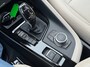 BMW X1 sDrive 2.0i 192pk autom ecc,beigeleer,lmv,navi,led,chroom,dglas,camera