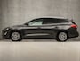 Ford Focus Wagon 1.0 EcoBoost Hybrid Titanium X 126Pk (PANORAMADAK, VIRTUAL COCKPIT, APPLE CARPLAY, GROOT NAVI, CAMERA, SPORTSTOELEN, GETINT GLAS, KEYLESS, LED ACHTERLICHTEN, NIEUWSTAAT)