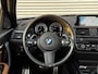 BMW 1-Serie M140i High Executive | LCI2 | Schuifdak | H&K | Camera | LED | Leder | NL Auto |