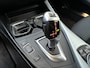 BMW 1-Serie 116d Sport Automaat / Airco / Schuif-Kanteldak / Navigatie / Sport Int / LM Velgen / Trekhaak