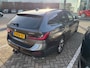 BMW 3-Serie Touring 330i High Executive I Trekhaak I Cruise Control I Leder