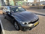 BMW 3-Serie Touring 330i High Executive I Trekhaak I Cruise Control I Leder