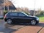 BMW 1-Serie 118i Business+ | Panoramadak | Cruise Control | Parkeersensoren | Sportstoelen |
