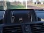 BMW 1-Serie 118i Business+ | Panoramadak | Cruise Control | Parkeersensoren | Sportstoelen |