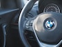 BMW 1-Serie 118i Business+ | Panoramadak | Cruise Control | Parkeersensoren | Sportstoelen |