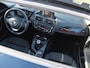 BMW 1-Serie 118i Business+ | Panoramadak | Cruise Control | Parkeersensoren | Sportstoelen |
