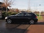 BMW 1-Serie 118i Business+ | Panoramadak | Cruise Control | Parkeersensoren | Sportstoelen |