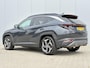 Hyundai Tucson 1.6 T-GDI PHEV Premium Sky 4WD / Adaptieve Cruise Control / Apple carplay-Android Auto / Stoelverwarming voor en achter / Stoelverkoeling voor / GROOT Glazen-schuifkanteldak / All seasonbanden / Navigatie /