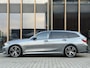 BMW 3-Serie Touring 330e M-sport | Panorama-dak | Sfeerverlichting | Head-up | Memor
