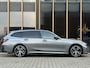 BMW 3-Serie Touring 330e M-sport | Panorama-dak | Sfeerverlichting | Head-up | Memor