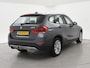 BMW X1 sDrive20i 184 PK AUT. ORIG. NL *94.700 KM* + TREKHAAK | NAVI PRO | MINERALGRAU