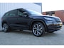 Skoda Kodiaq 1.5 TSI Sportline Business | Incl. 12 maanden garantie | Wegklapbare trekhaak | Apple CarPlay | Canton audio | Adaptive cruise | Stoelverwarming | Achteruitrij camera | Parkeersensoren |