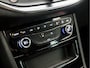 Opel Astra Sports Tourer 1.2 Elegance Sport (APPLE CARPLAY, GROOT NAVI, MATRIX LED KOPLAMPEN, KEYLESS, CAMERA, ADAPTIVE CRUISE, GETINT GLAS, LM VELGEN, NIEUWSTAAT)