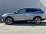 Nissan Qashqai 1.3 MHEV Tekna Plus Automaat / Panoramadak / Elektrisch Bedienbare Stoelen met Massagefunctie & Geheugen / BOSE Premium Audio / All Season Banden / Apple Carplay & Android Auto / Elektrische Achterklep / Head-Up Display /