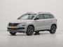 Skoda Karoq 1.5 TSI ACT 150pk DSG Sportline Business Trekhaak Navigatie CantonSound Stoelverwarming Camera Carplay