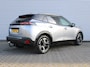 Peugeot e-2008 EV GT 54 kWh | Trekhaak | Stoelverwarming + massage | Camera | Cruise adapt. | Navi | 17" LM | Warmtepomp | LED | Zeer nette auto |