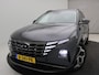 Hyundai Tucson 1.6 T-GDI HEV Premium Sky / Groot glazen schuif-kanteldak / 1650KG Trekgewicht / Navigatie / Stuur-, stoel- en achterbankverwarming /Leder / Stoelventilatie / Elektrische stoelen & klep / Camera 360° / Apple Carplay Android /