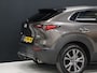 Mazda CX-30 2.0 e-SkyActiv-X M Hybrid Luxury [ADAPTIVE CRUISE, BLUETOOTH, CAMERA, ELEK STOELEN, VOL LEDER, STOEL EN STUURVERWARMING, BOSE AUDIO, ELEK.. ACHTERKLEP, HEAD UP, TREKHAAK,CLIMATE, NAV, NIEUWSTAAT]
