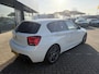 BMW 1-Serie M135i High Executive AUTOMAAT |HARMAN/KARDON | DODEHOEK DETECTIE | ACHTERUIT RIJ CAMERA| SPORT STOELEN| KEYLESS ENTRY/GO|NAVIGATIE | BI- XENON KOPLAMPEN | STOEL VERWARMING |