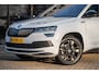 Skoda Karoq 1.5 TSI ACT Sportline Business | Trekhaak | Adapt. Cruise | CANTON | Camera | 19" | Winterpakket