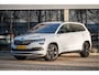 Skoda Karoq 1.5 TSI ACT Sportline Business | Trekhaak | Adapt. Cruise | CANTON | Camera | 19" | Winterpakket