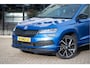 Skoda Karoq 1.5 TSI ACT Sportline Business | Trekhaak | Adapt. Cruise | CANTON | Camera | 19" | Winterpakket