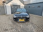 BMW 1-Serie 118i Executive,Parking system,Cruise control,Navi,Climate control,Schuifkantel dak