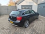 BMW 1-Serie 118i Executive,Parking system,Cruise control,Navi,Climate control,Schuifkantel dak