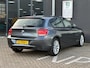 BMW 1-Serie 118i Upgrade Edition/2E EIG/6-BAK/NAVI/CAMERA/NL-AUTO NAP!!
