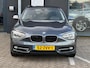 BMW 1-Serie 118i Upgrade Edition/2E EIG/6-BAK/NAVI/CAMERA/NL-AUTO NAP!!
