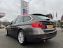 BMW 3-Serie Touring 316i High Executive 136pk,Apk 14/1/27,Airco,Cruise,Navi,St verw.