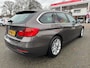 BMW 3-Serie Touring 316i High Executive 136pk,Apk 14/1/27,Airco,Cruise,Navi,St verw.