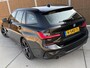 BMW 3-Serie Touring 320e M sport Automaat | Zwart optiek | LED laserlichten | Leren bekleding | Stoelverwarming | DAB ontvanger | HiFi installatie | Navigatiesysteem | Cruise control adaptief | Climate control | Parkeersensoren voor en achter