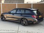 BMW 3-Serie Touring 320e M sport Automaat | Zwart optiek | LED laserlichten | Leren bekleding | Stoelverwarming | DAB ontvanger | HiFi installatie | Navigatiesysteem | Cruise control adaptief | Climate control | Parkeersensoren voor en achter
