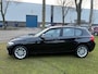 BMW 1-Serie 116i Centennial Executive * ABS * Cruisecontrol * P-camera * LM velgen * bluetooth * audio bediening stuur