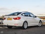 BMW 3-Serie Gran Turismo 320d Luxury Panoramadak HUD Leder Trekhaak Bi-xenon Stoelverwarming Navigatie